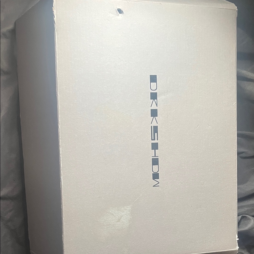 Rick Owens Black and Cream Sneaker Tongue Label Detail